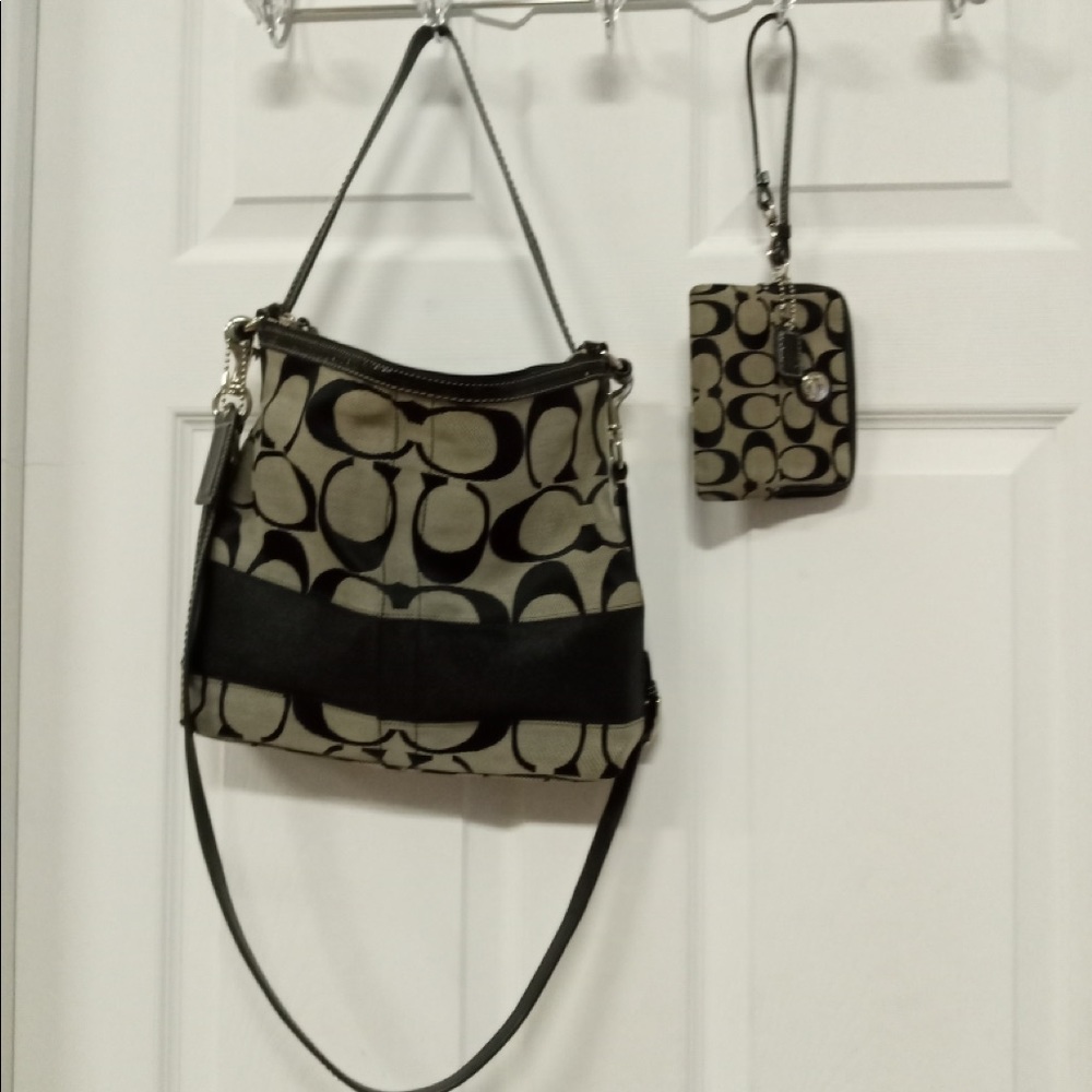 Authentic Coach crossbody and wristlet together.